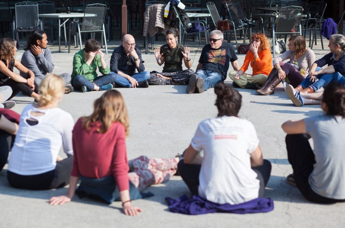 Circle of people talking, image from Julie's Bicycle