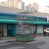 Animal Tower. Intervention in public space, Anyang, South Korea, 2008. Construction of iron and glass, rabbits, hens, turtles, fishes.