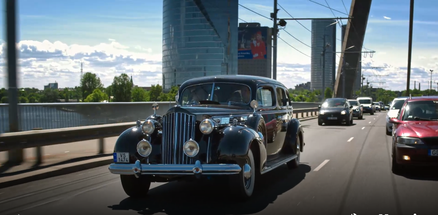 Classic car on streets of Riga, Latvia; promotional film for Riga Motor Museum