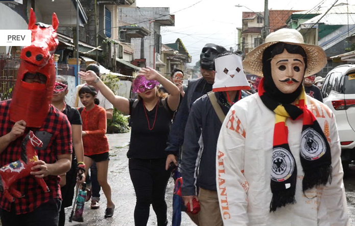 Image from Mark Salvatus Ensayo film, showing people in masks.