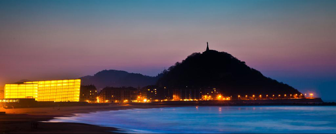 Night view of city of san sebastian donostia across the bay