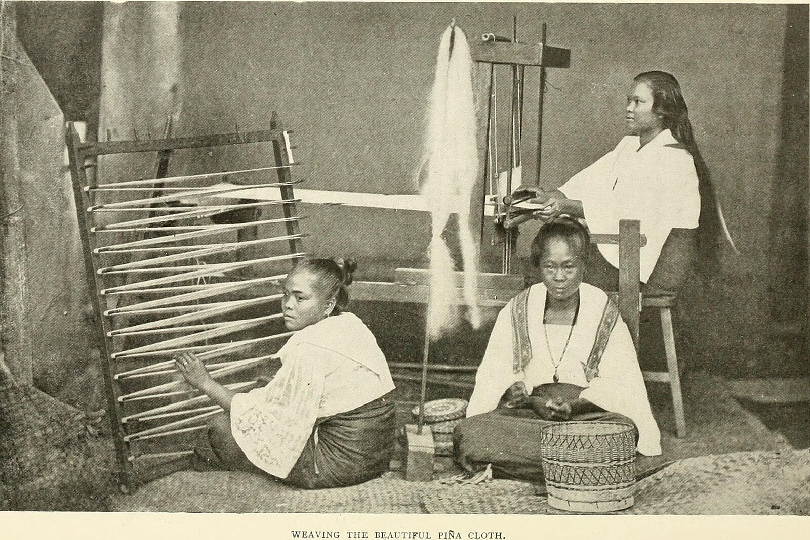 Women piña weavers from Panay Island at the turn of the 20th century. Photo © Ramon Reyes Lala, The Philippine Islands.