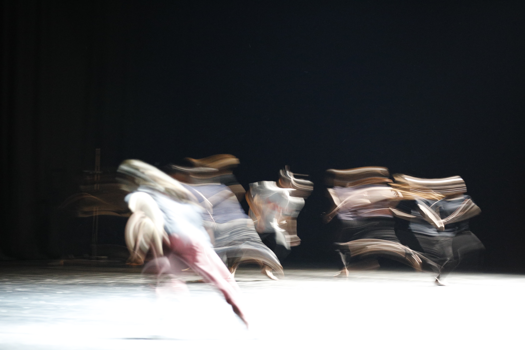 Image of blurred dancers for SWEAT international dance festival, by Wendy Chu